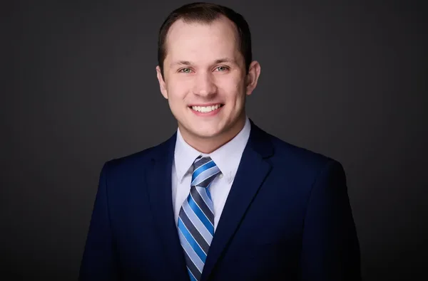 Headshot of Caleb J. Moyer, CFP, CFA, EA